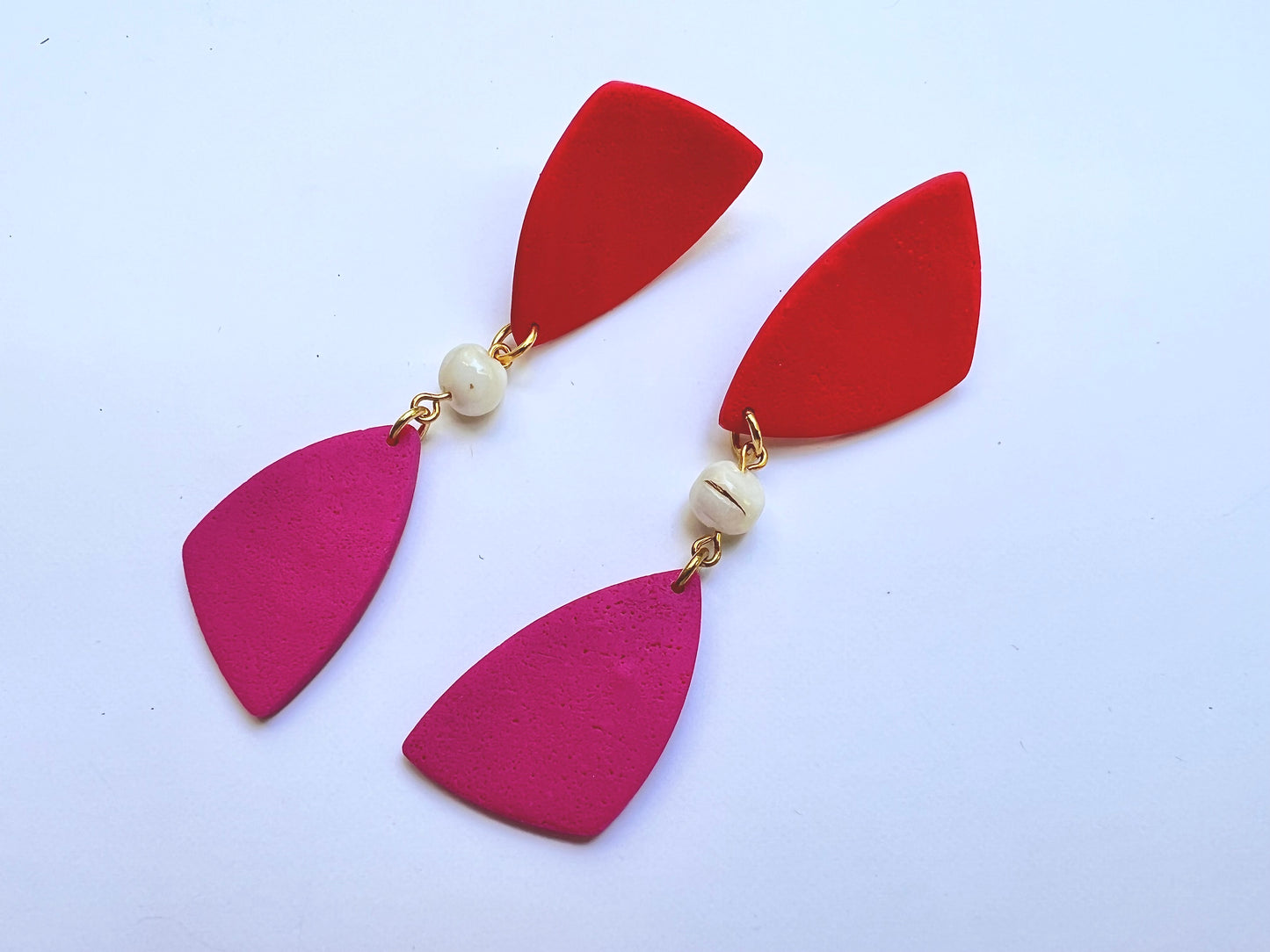 Dangle red-magenta earrings with shell bead
