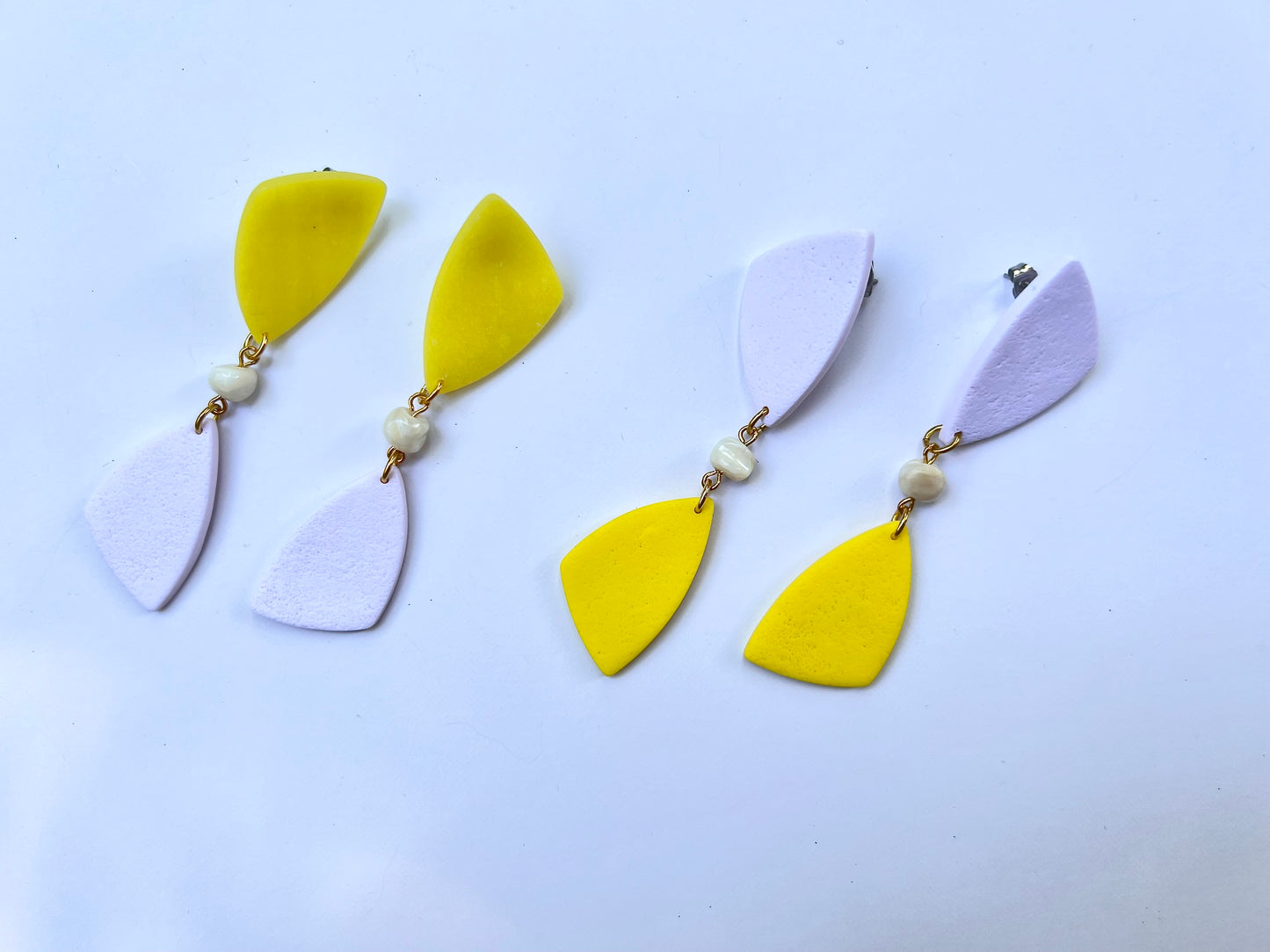 Dangle white-yellow earrings with shell bead