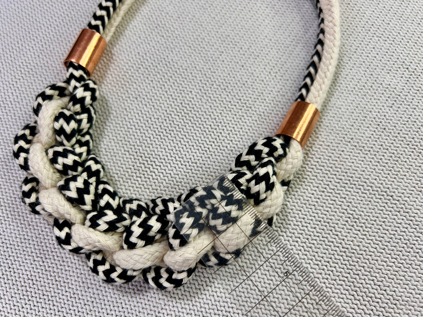 Chunky monochrome rope necklace with copper accents