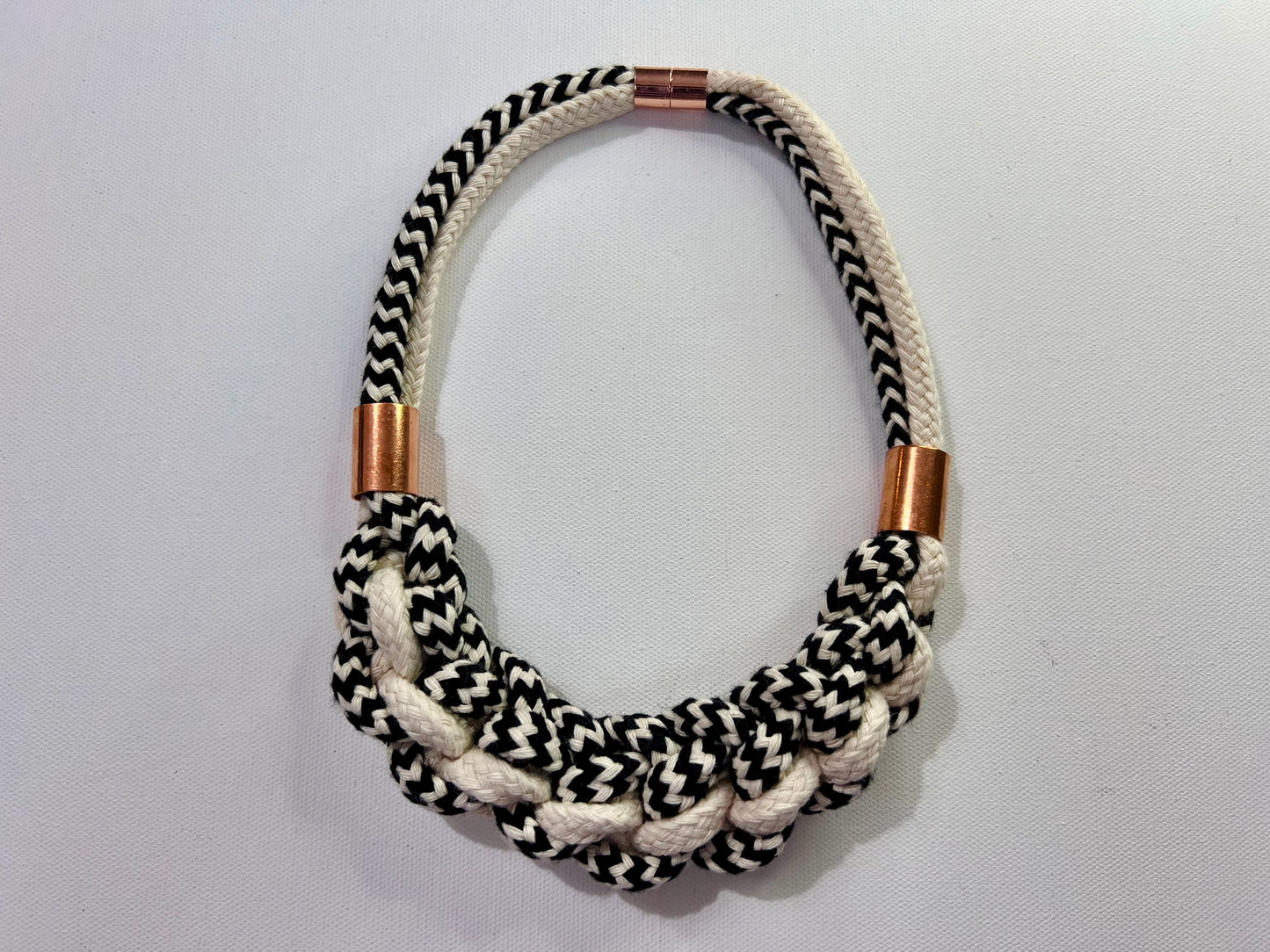 Chunky monochrome rope necklace with copper accents