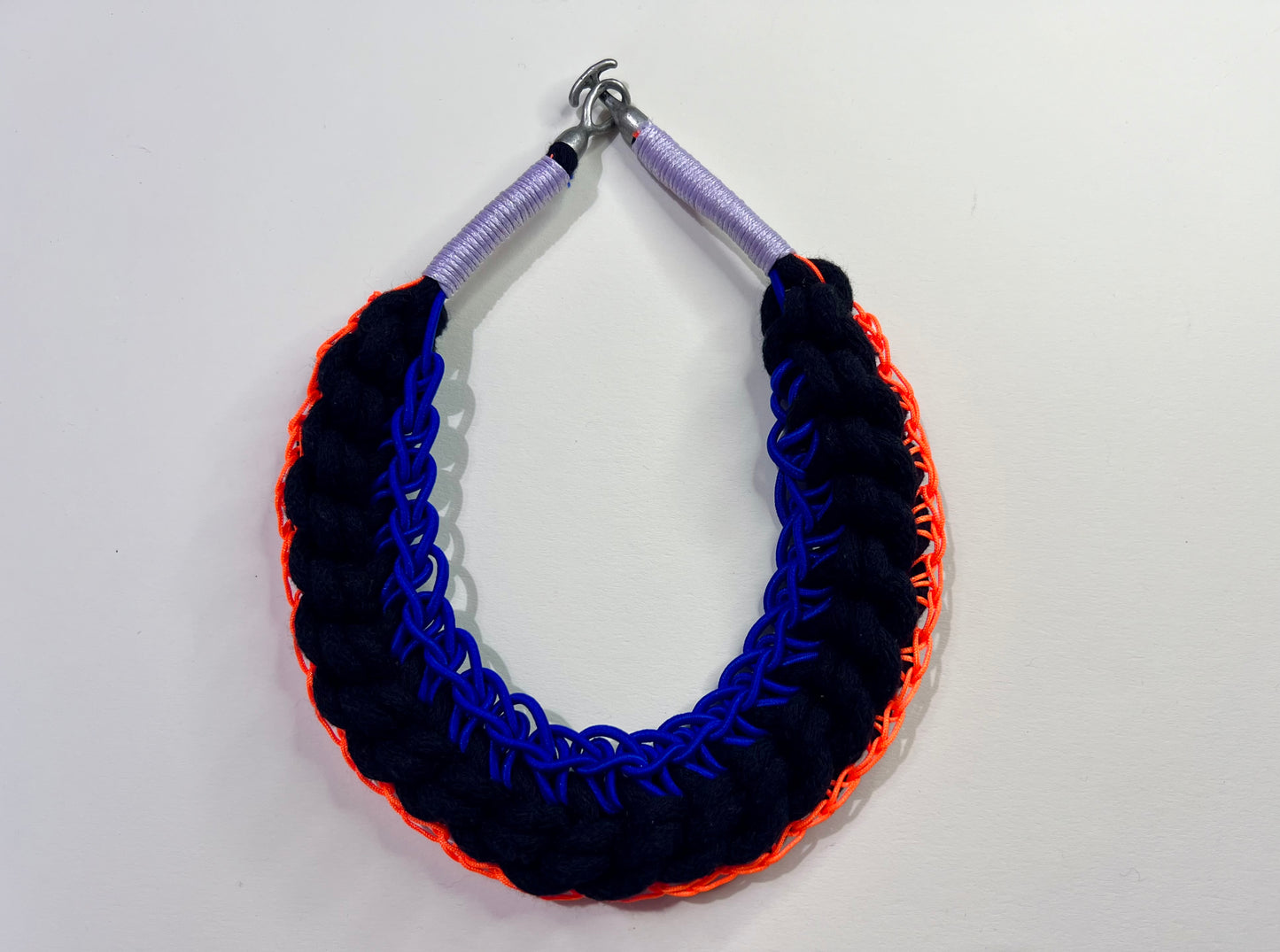 Black rope necklace with electric blue and neon orange accents