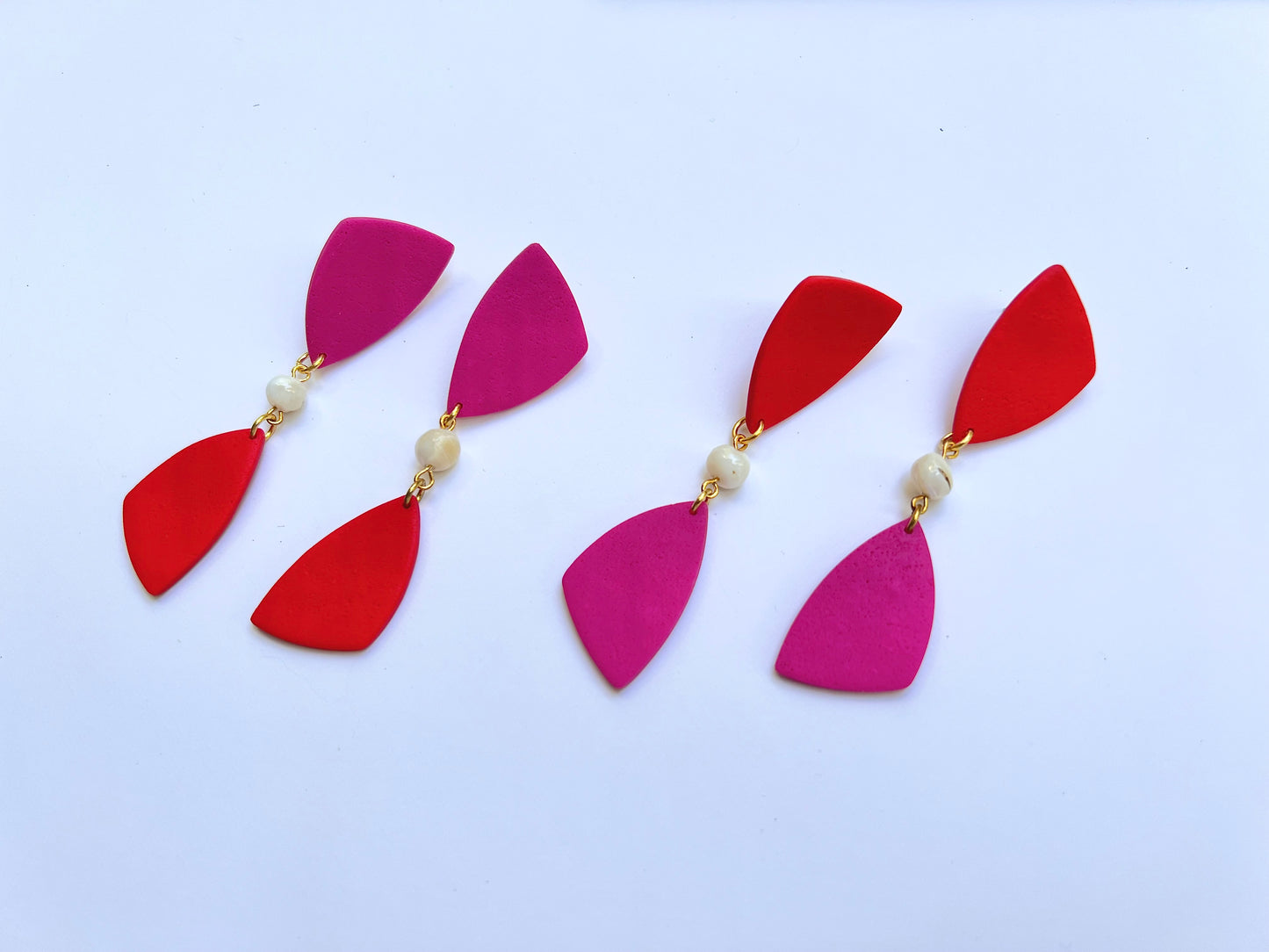 Dangle red-magenta earrings with shell bead