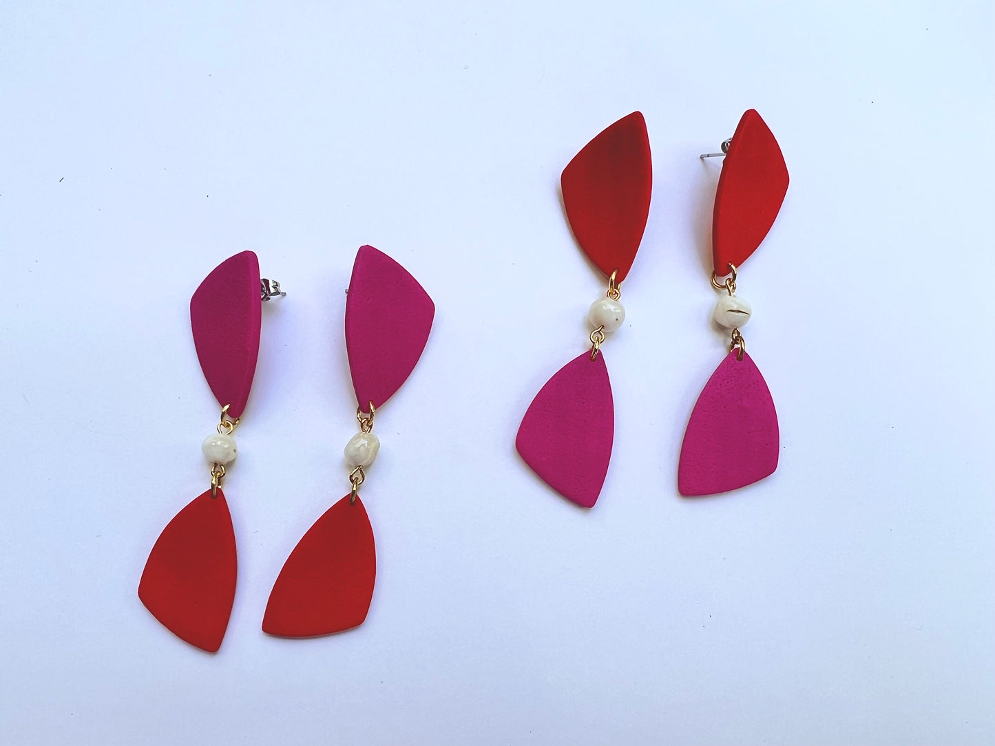 Dangle red-magenta earrings with shell bead