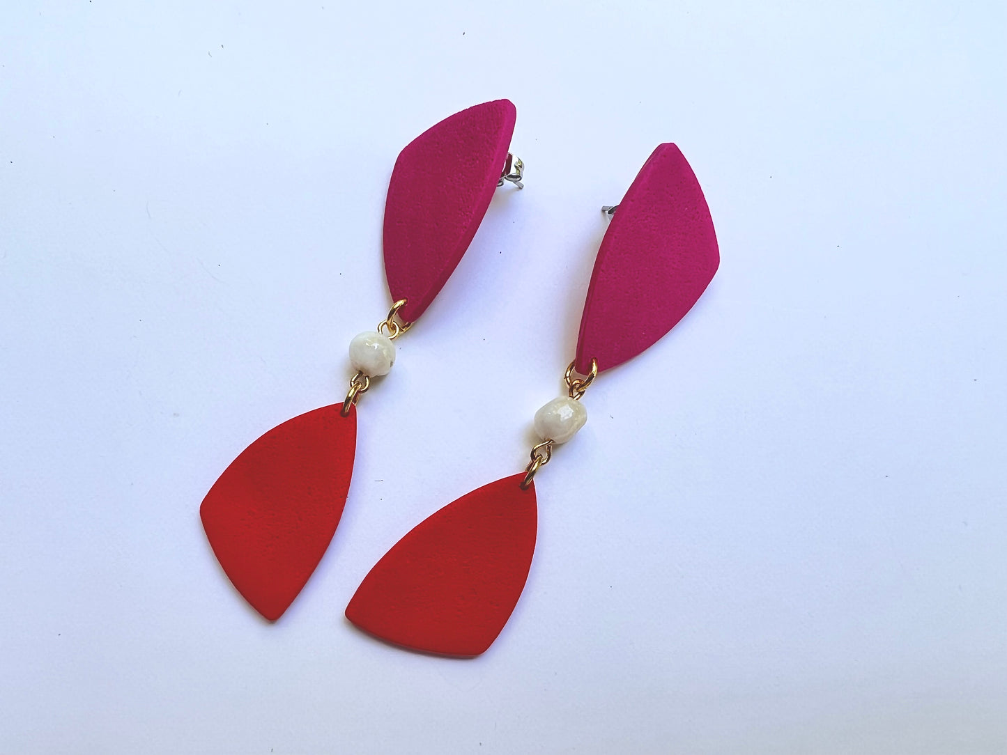 Dangle red-magenta earrings with shell bead