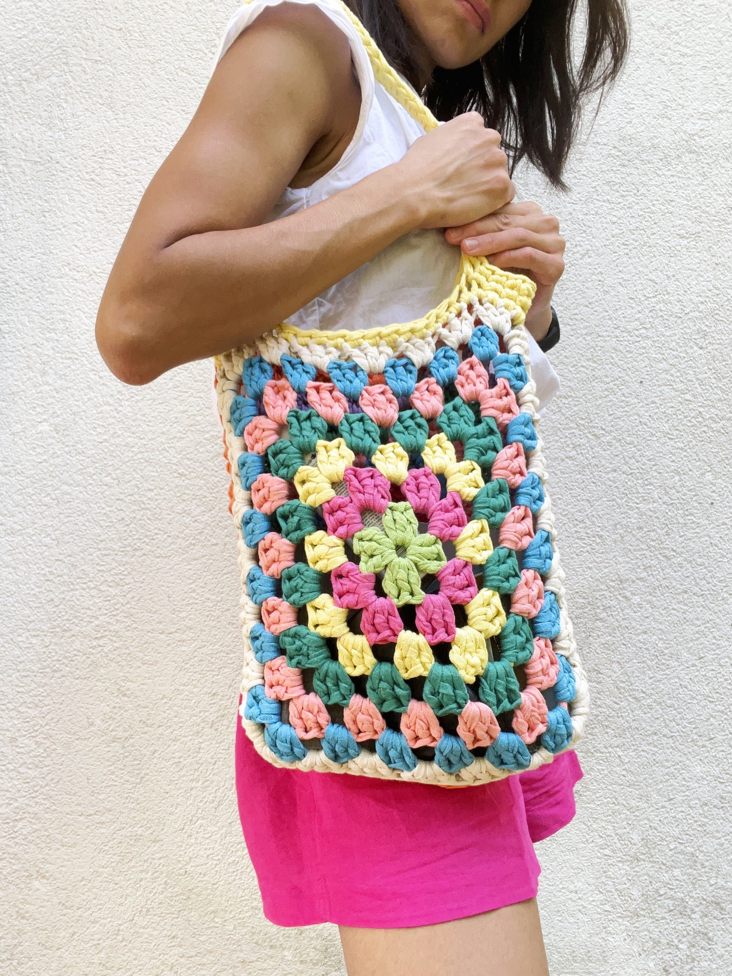 Crocheted colourful granny square tote bag