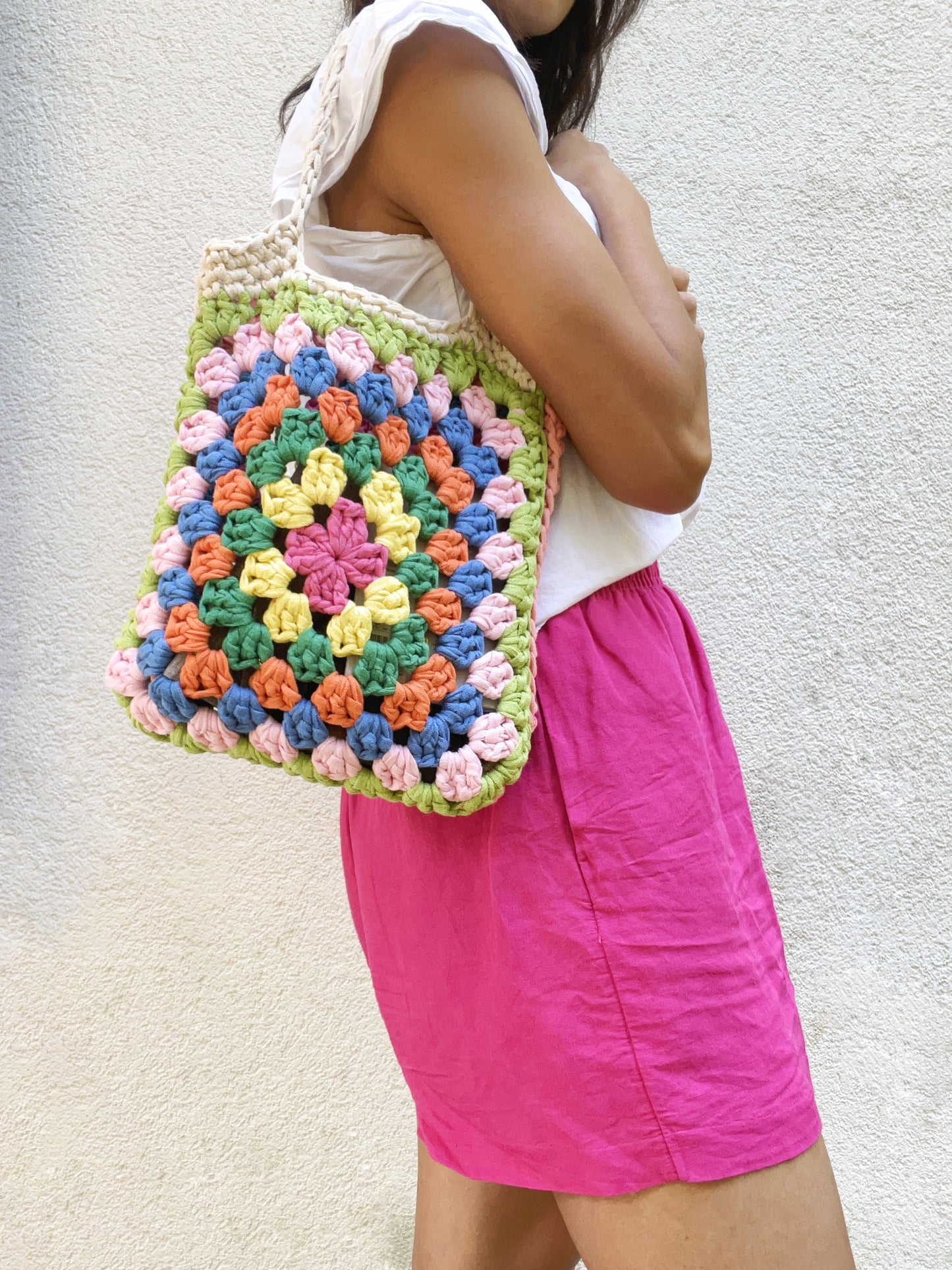 Crocheted colourful granny square tote bag