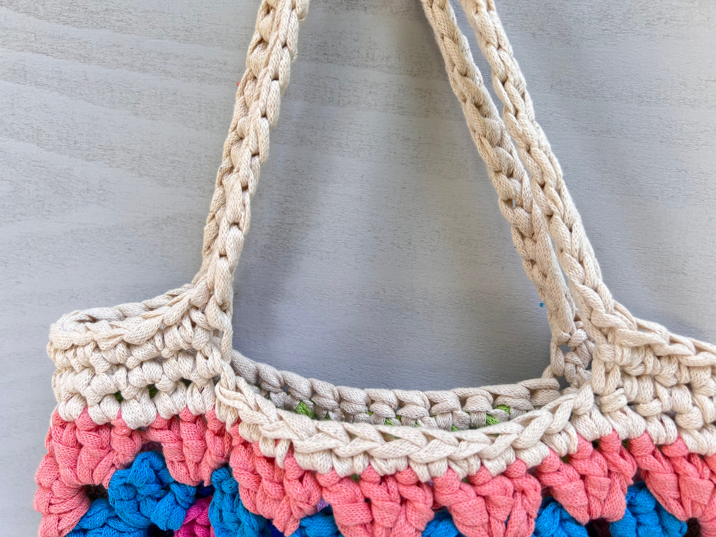 Crocheted colourful granny square tote bag