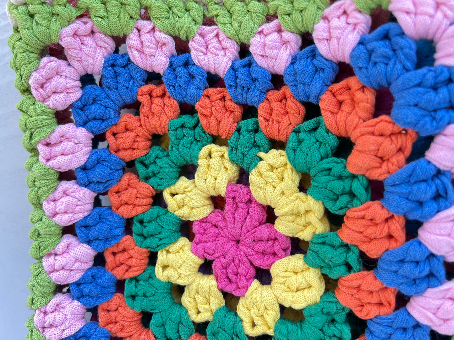 Crocheted colourful granny square tote purse