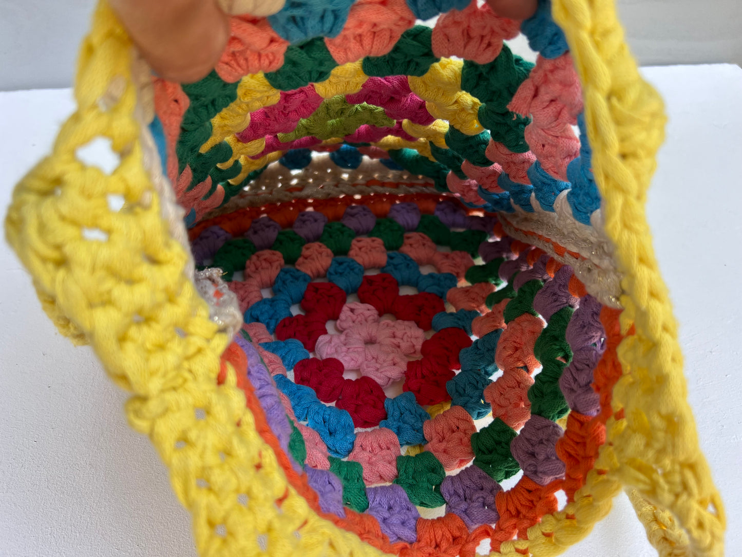 Crocheted colourful granny square tote bag